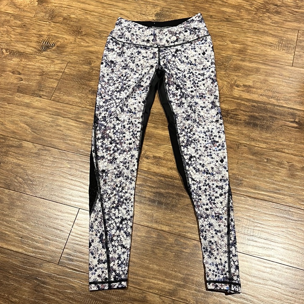 Victoria’s Secret Sport Star patterned leggings with mesh back